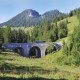 Bus der Wendelstein-Ringlinie bei der Fahrt über die malerische Sudelfeld-Mautstraße, © Peter Zangerl, Typomedia Bus der Wendelstein-Ringlinie bei der Fahrt über die malerische Sudelfeld-Mautstraße, © Peter Zangerl, Typomedia